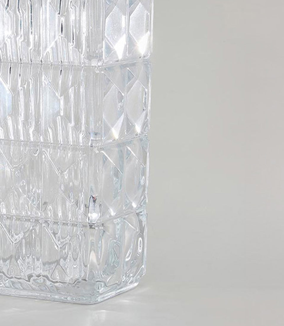 Geometric textured clear glass vase with diamond facet pattern