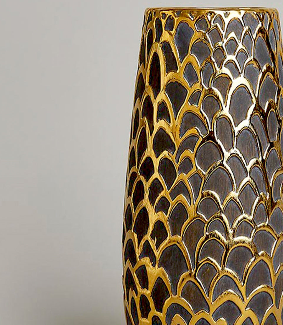 Tall tapered vase with gold scale-pattern detailing and charcoal grey recessed panels