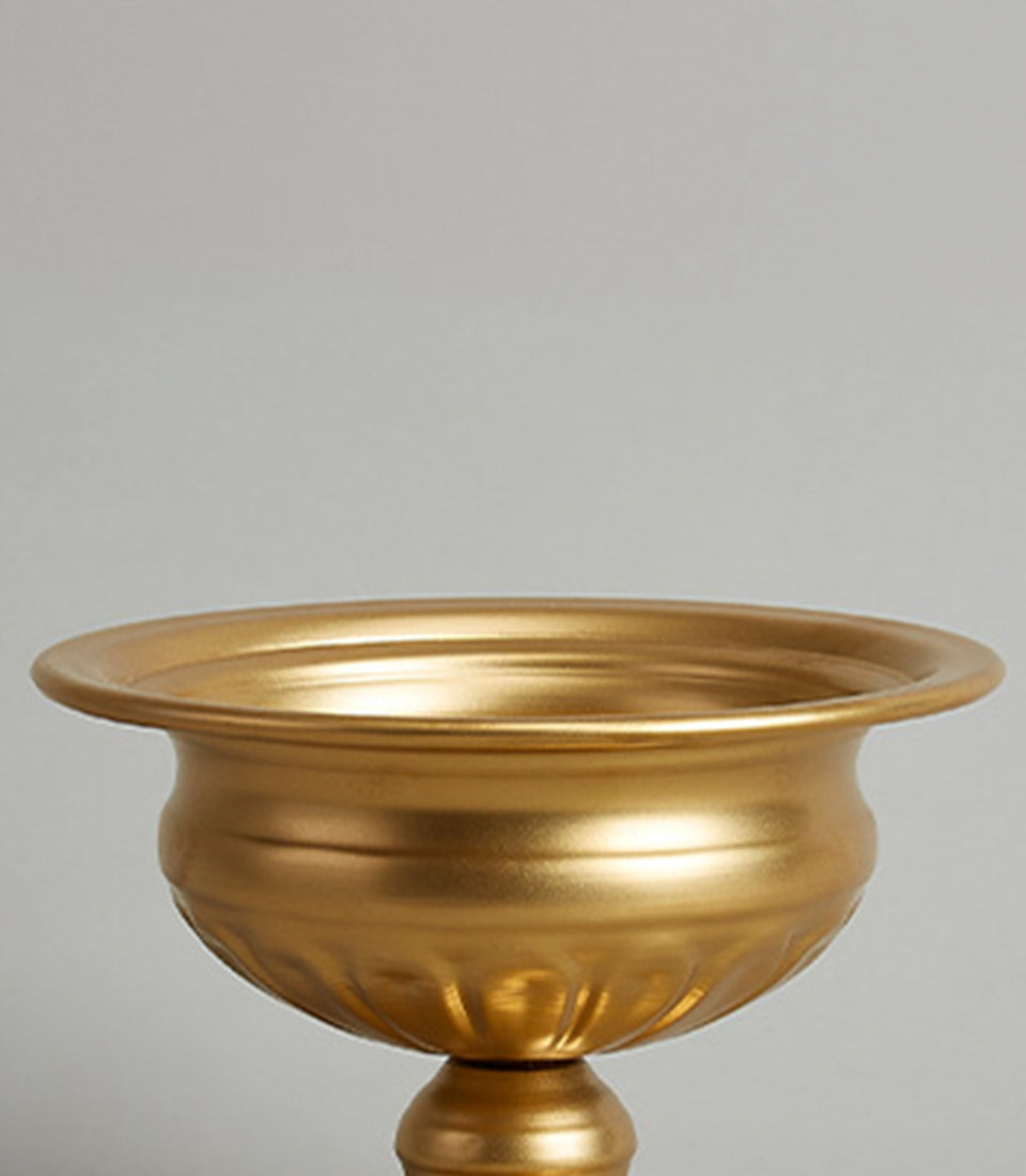 Golden pedestal bowl with fluted texture and gleaming metallic finish, luxury home décor gift