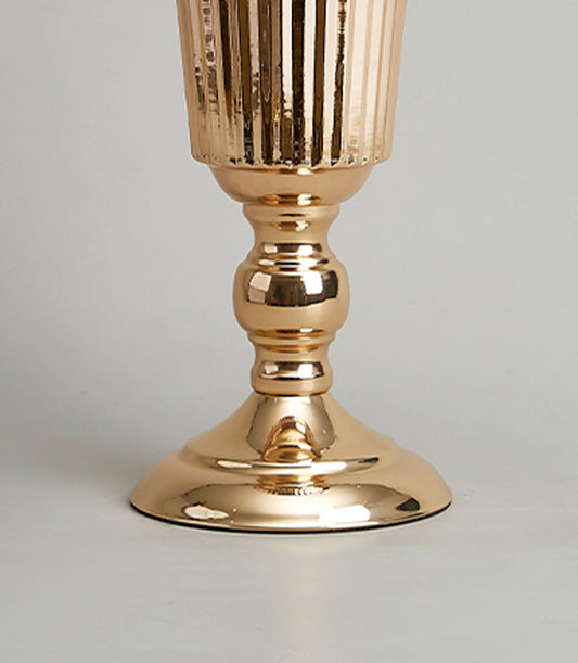 Golden ribbed metal vase with ornate stem and flared base, luxury gift accessory