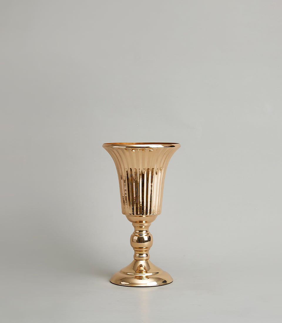 Elegant golden vase with ribbed flared rim and decorative stem, luxury gift hamper accessory