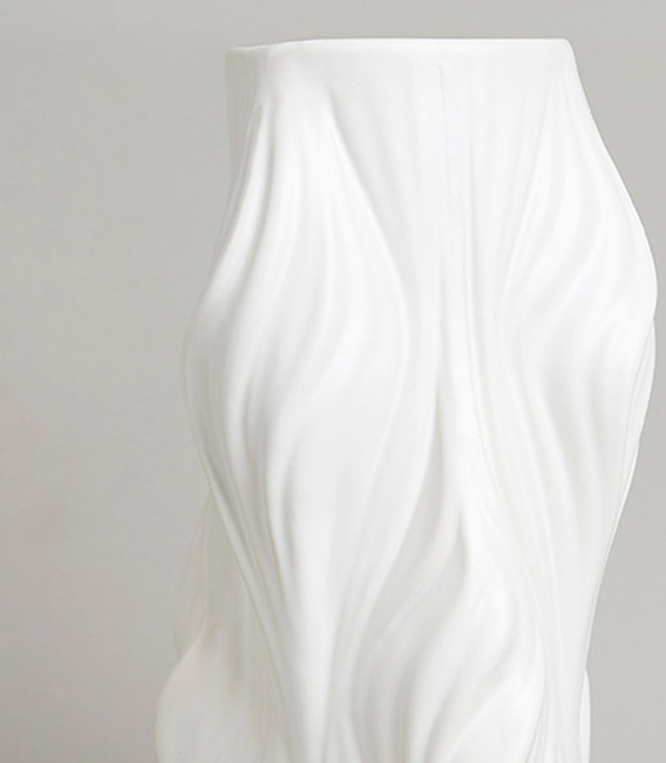 White ceramic vase with wave-textured sculptural ridges, artisan gift piece