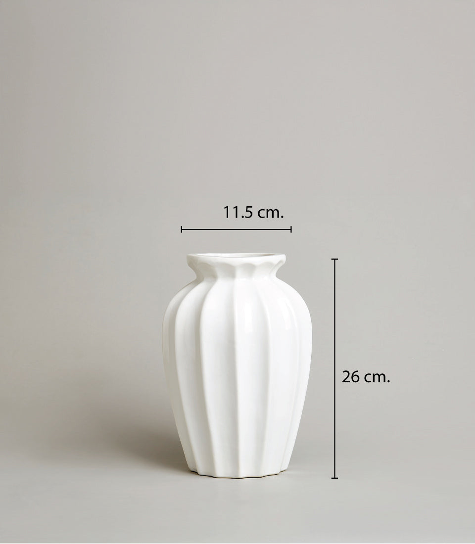 White ceramic vase with ribbed fluted design, elegant gift for any occasion