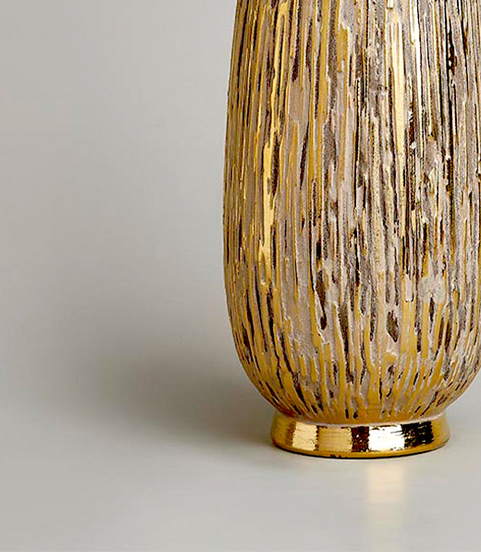 Rustic gold and off-white textured vase with brushstroke patterns and metallic finish