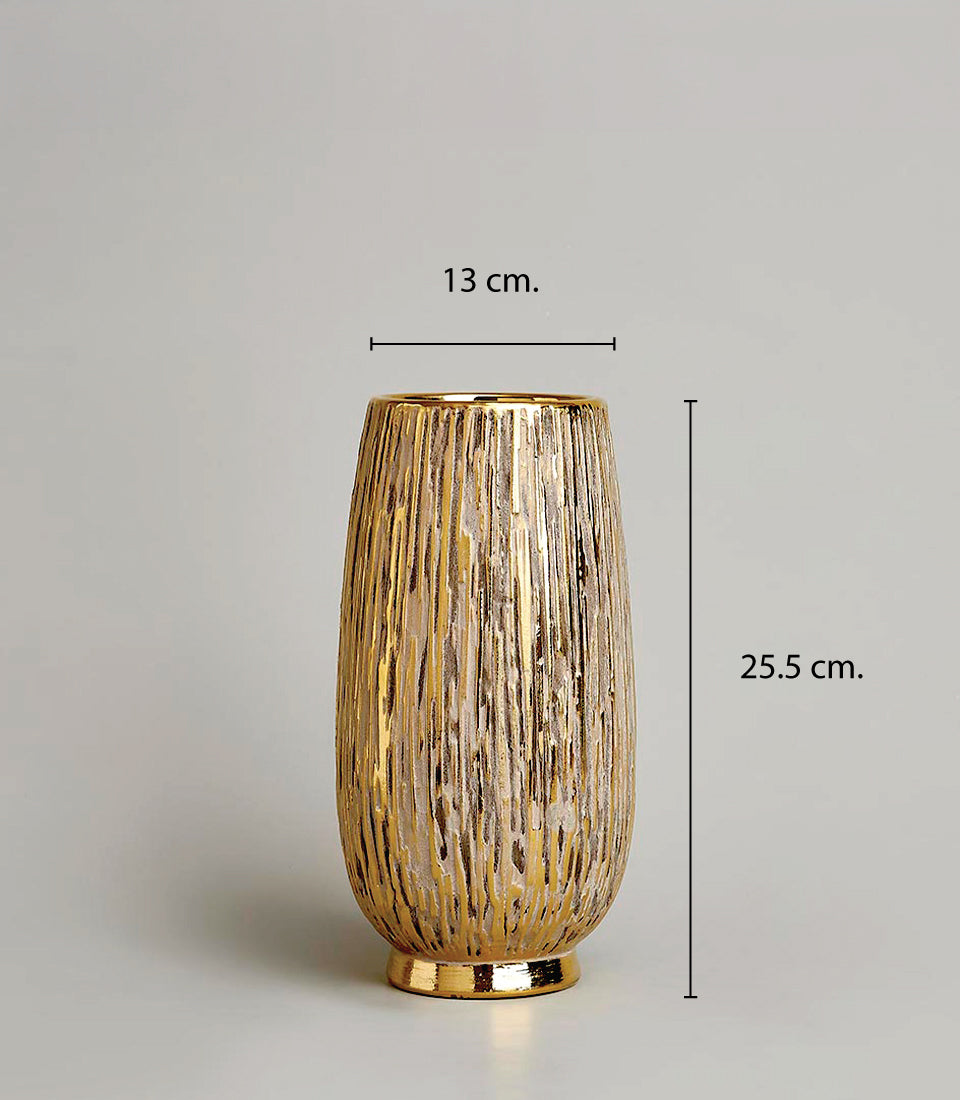 Textured gold and white ceramic vase with vertical striped finish, 25.5 cm height