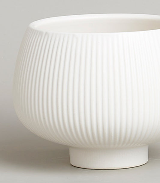 Elevated Serenity white ceramic vase with ribbed texture and rounded form