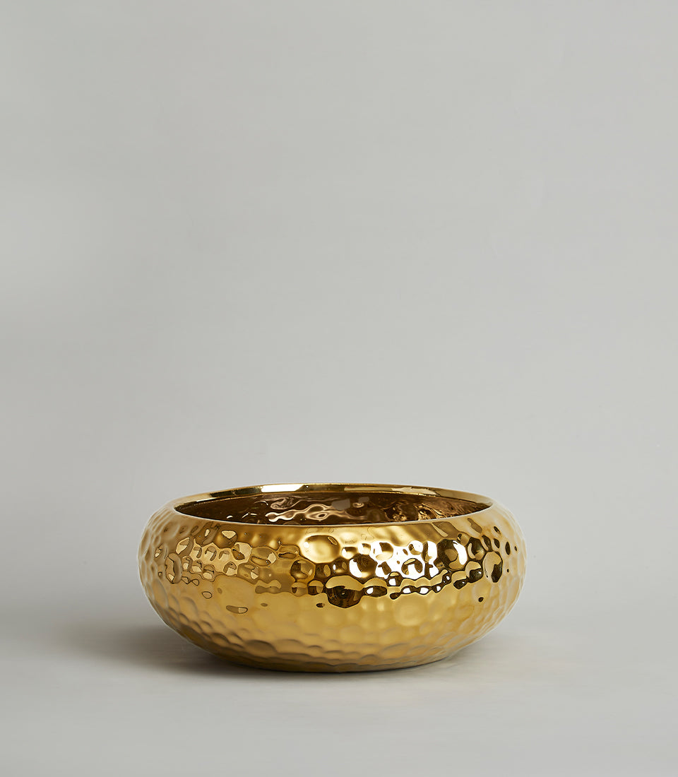 Large hammered gold ceramic bowl with textured metallic finish for luxury home decor or gifting