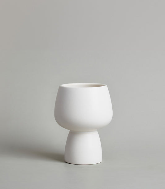 Minimalist white ceramic chalice vase with modern two-part design for contemporary home decor