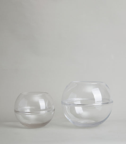 Clear glass bubble vases in smoky and transparent finishes, perfect for fresh flowers or standalone display