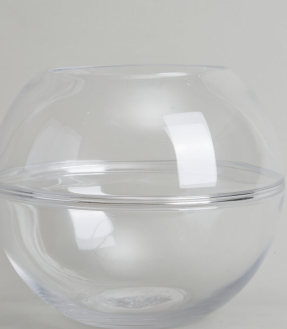 Clear glass bubble vase with water, minimalist sphere design for fresh flowers or décor