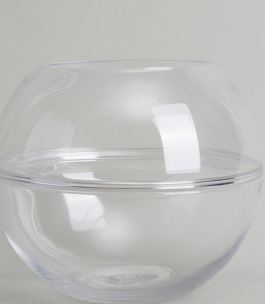 Clear glass bubble vase with water, minimalist sphere design for fresh flowers or décor