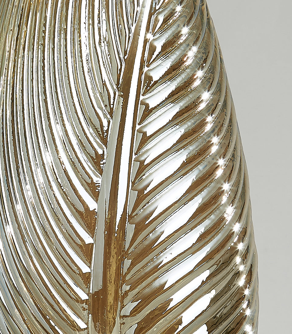 Silver leaf-patterned glass vase with iridescent metallic finish and detailed ridged texture