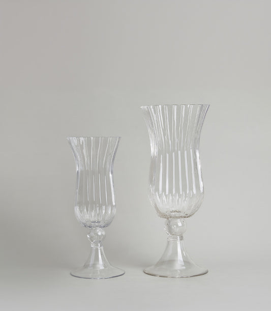 Pair of elegant ribbed glass vases with flared rims and spherical stem details