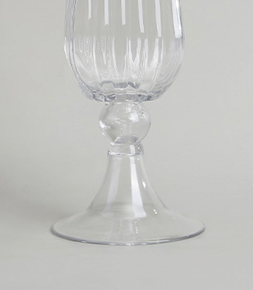 Pair of elegant ribbed glass vases with tapered bulbous bowls and flared trumpet bases
