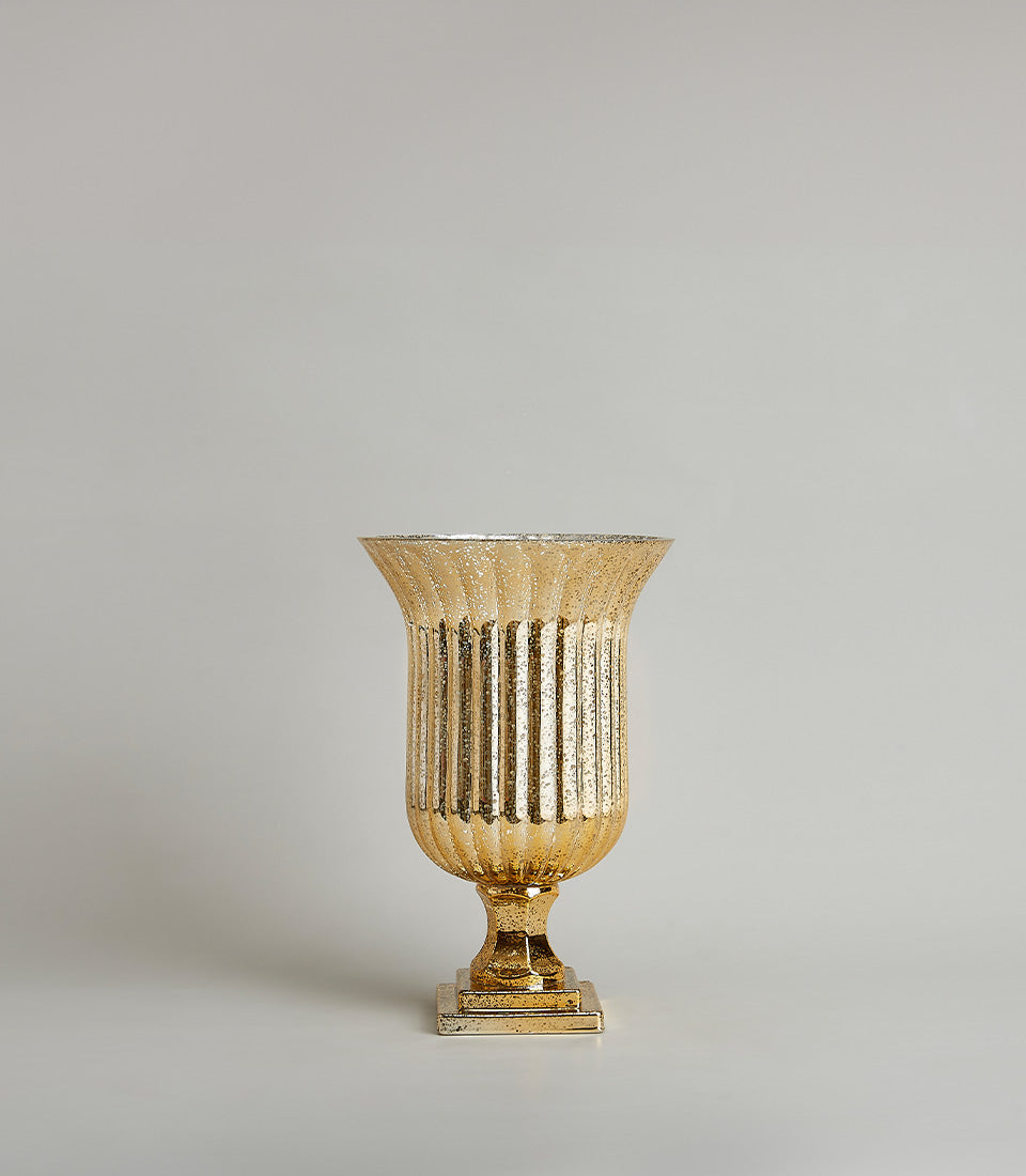 Tall gold fluted pedestal vase with antique mercury glass finish and stepped base