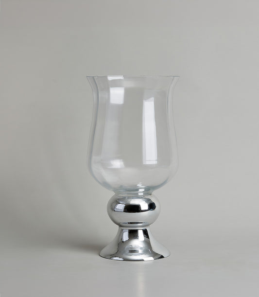 Clear glass vase with a tulip shape and polished chrome base, awaiting a premium flower arrangement from Flowers by Basketeer.