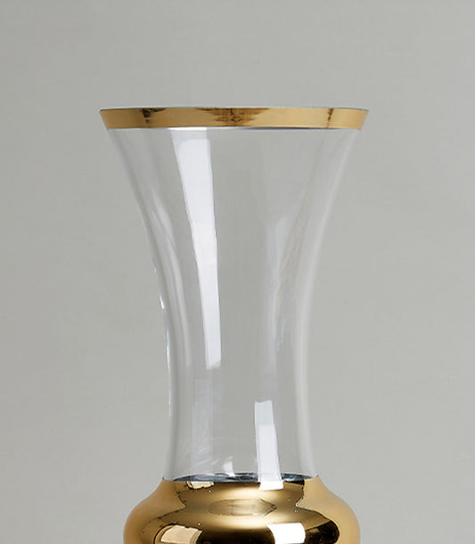 Clear glass vase with gold-trimmed rim and bulbous base, elegant home décor accent