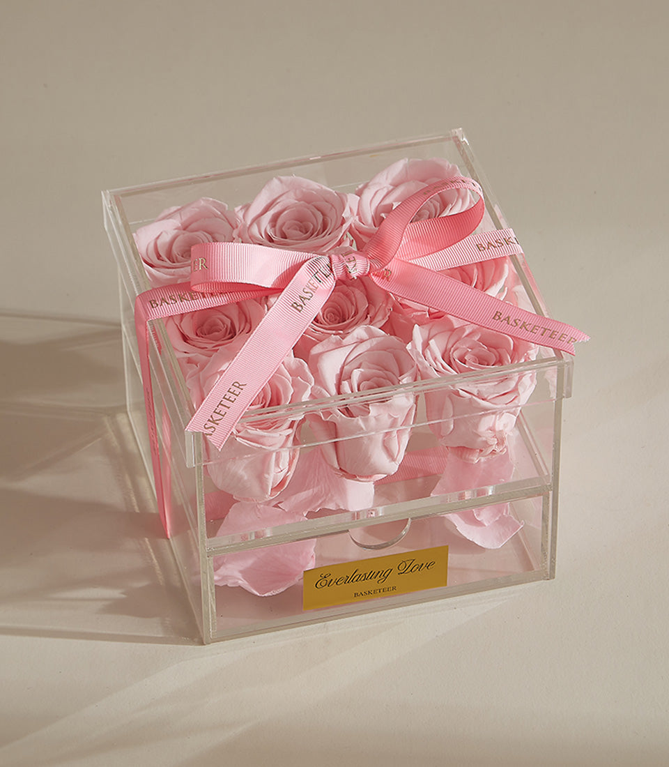Luxury preserved pink roses in acrylic box with ribbon and keepsake drawer