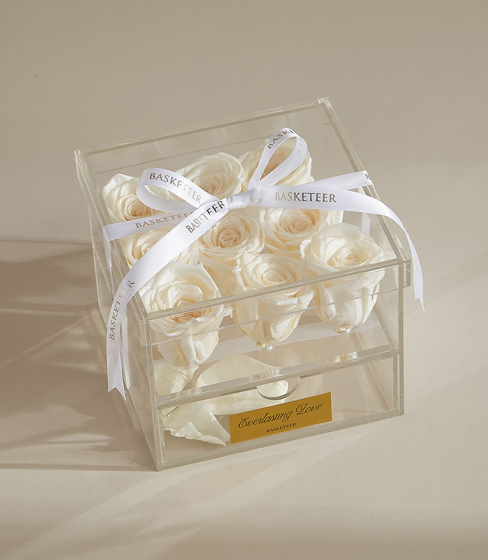 Metalized white preserved roses in clear acrylic luxury gift box with ribbon bow and gold "Everlasting Love" drawer