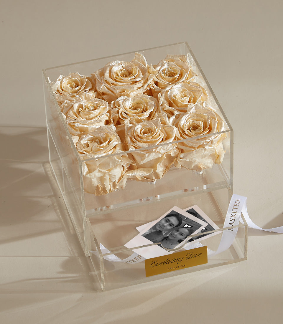 Champagne preserved roses in acrylic box with keepsake drawer and memory photos