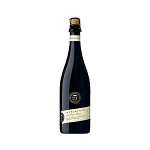 Premium white wine bottle with gold foil seal and elegant black label, luxury cheese and charcuterie gift hamper pairing