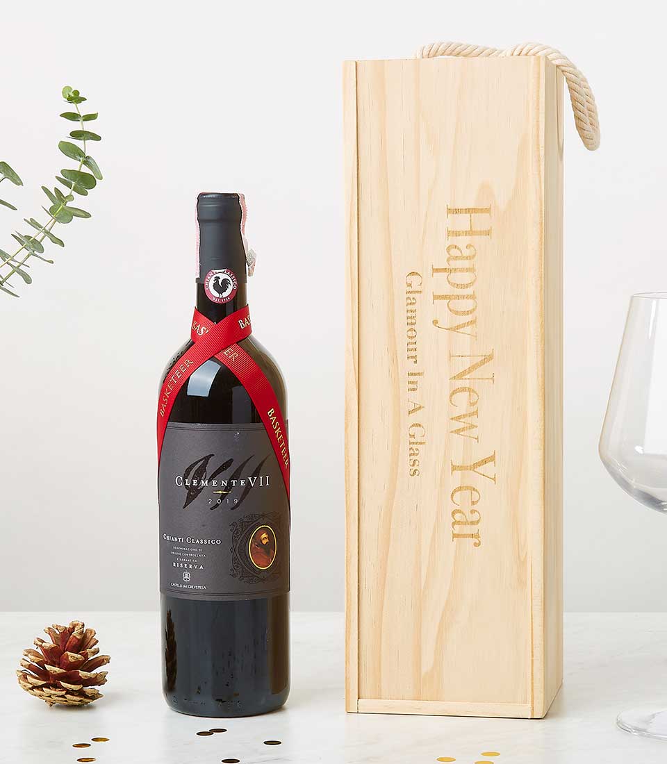 Award-winning Chianti Classico Riserva in engraved pine wood gift box with festive ribbon
