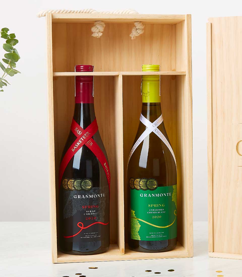 Award-winning red and white wine pairing in wooden gift box with rope handle