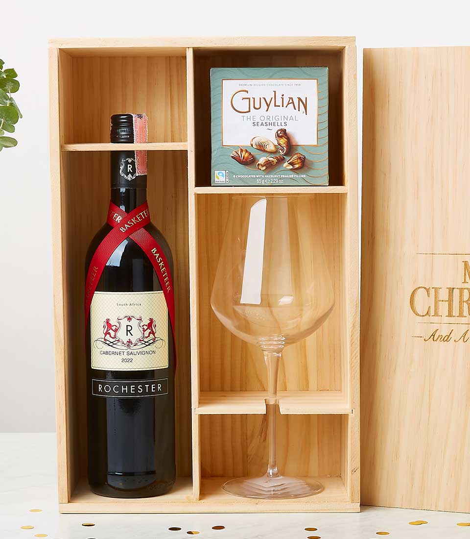 Chic wine gift set in pine box with Cabernet Sauvignon, chocolates, wine glass and gold confetti