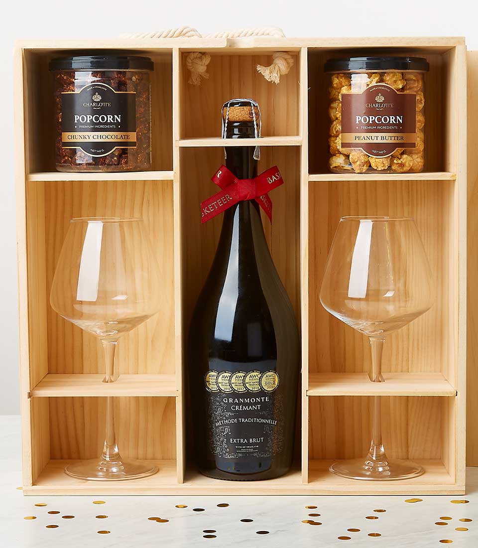 Luxury gift box with award-winning sparkling wine, wine glasses, and gourmet popcorn treats