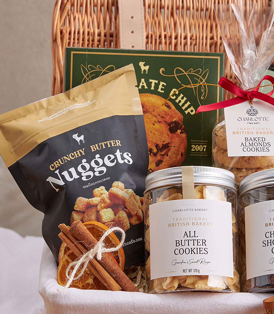 Premium British cookies and baked treats gift hamper with chocolate chip cookies, butter nuggets, and almonds in luxury