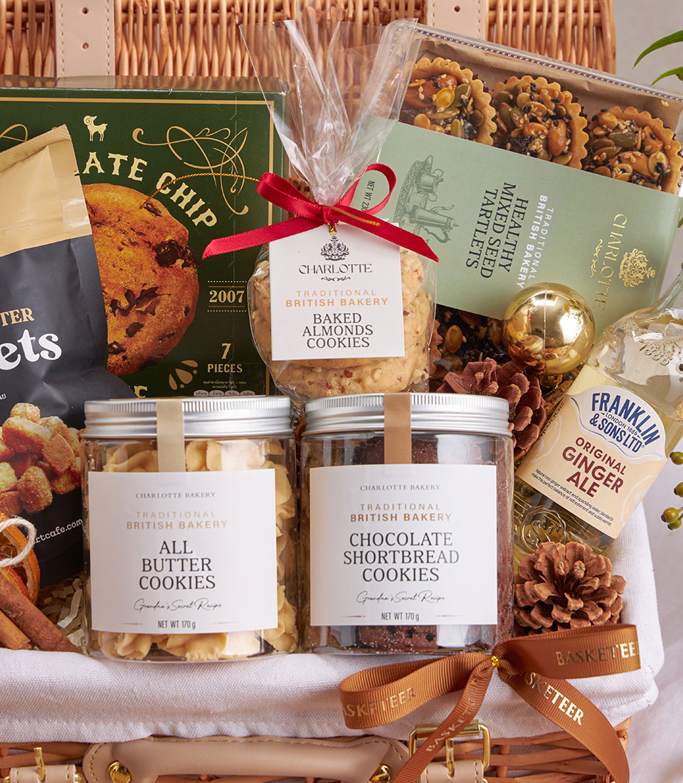 Premium British baked goods and ginger ale gift basket with almond cookies, seed tartlets, and chocolate shortbread
