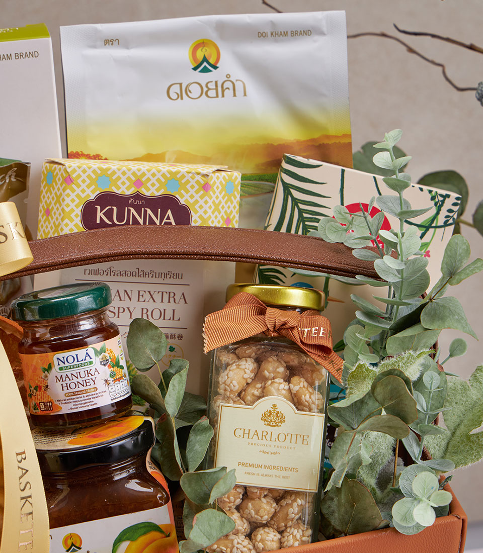 Premium wellness gift basket with artisan honey, superfoods and gourmet treats in natural leather hamper