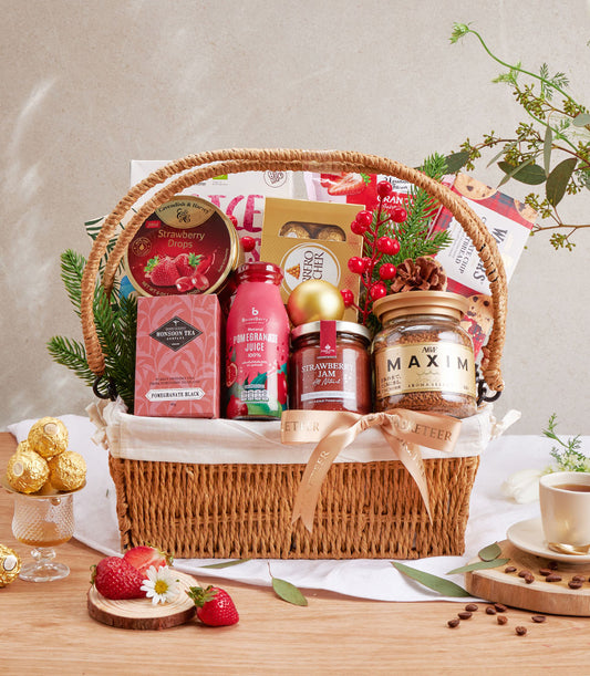 Luxury strawberry, chocolate and gourmet treats hamper with premium tea, jam, and coffee in wicker basket