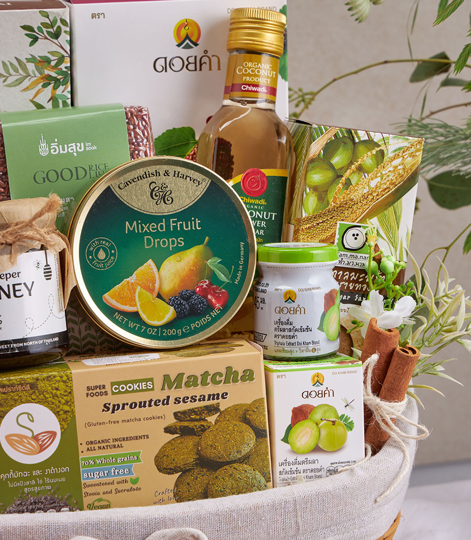 Premium organic superfoods gift basket with coconut oil, brown rice, matcha cookies, honey, and artisan wellness treats