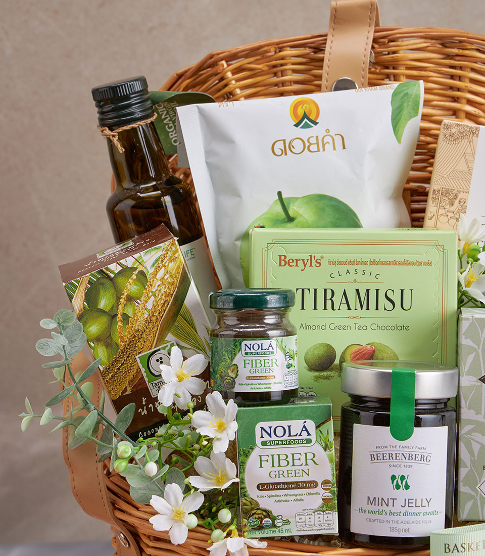 Premium olive oil and green wellness gift basket with artisan superfoods and handcrafted wicker handle