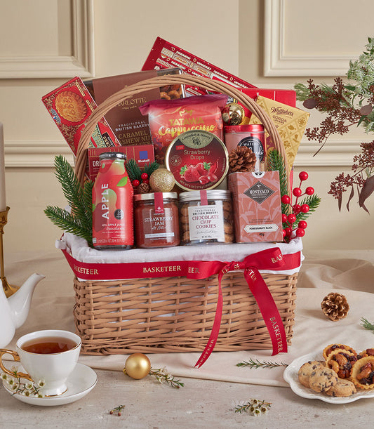 Red velvet luxury gift hamper with gourmet treats, festive ribbons, and holiday botanicals for New Year celebrations