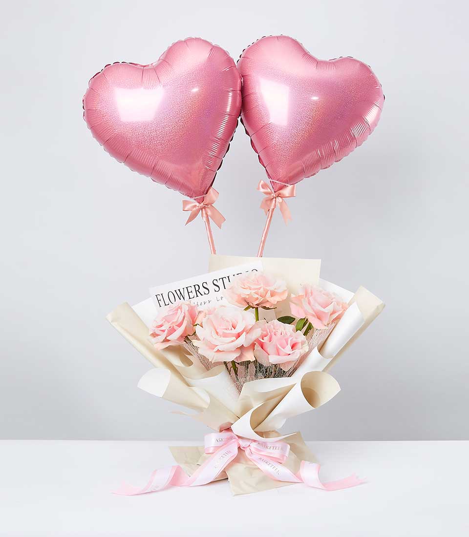 Pink rose bouquet with metallic heart balloons and satin ribbon bow, romantic gift set for celebrations