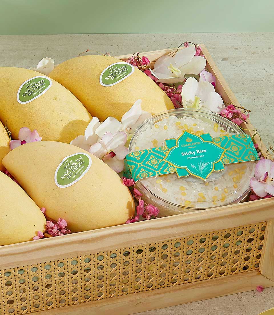 Summertime Mango Surprise luxury gift box with Nam Doc Mai mangoes, sticky rice, and orchids in rattan wooden tray