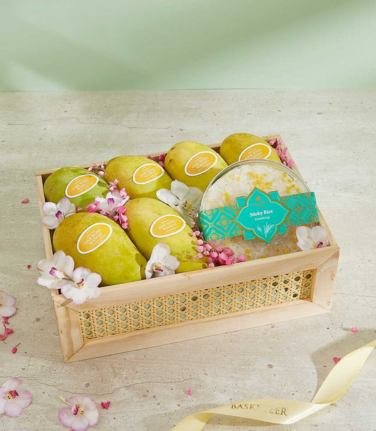 Premium wooden gift basket with Thai Oak Rong mangoes, sticky rice, and white orchids