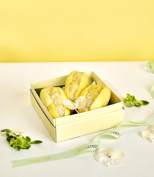 Monthong durian stuffed with sticky rice and mung beans in premium gift box with ribbon and flowers