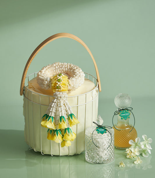 Blessing Garland Songkran gift basket with phuang malai garland, perfumed powder, and scented water