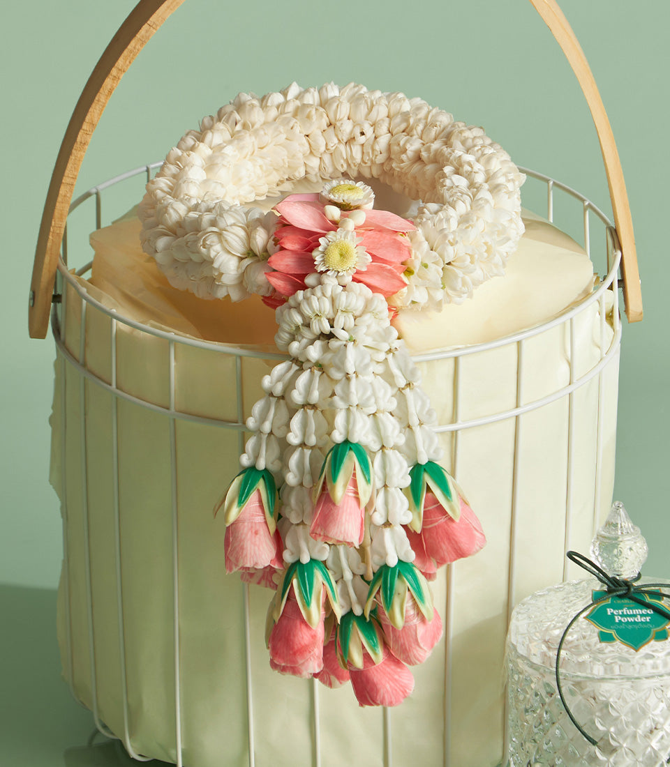 White jasmine phuang malai garland with pink rosebuds and perfumed powder gift set for Songkran celebration