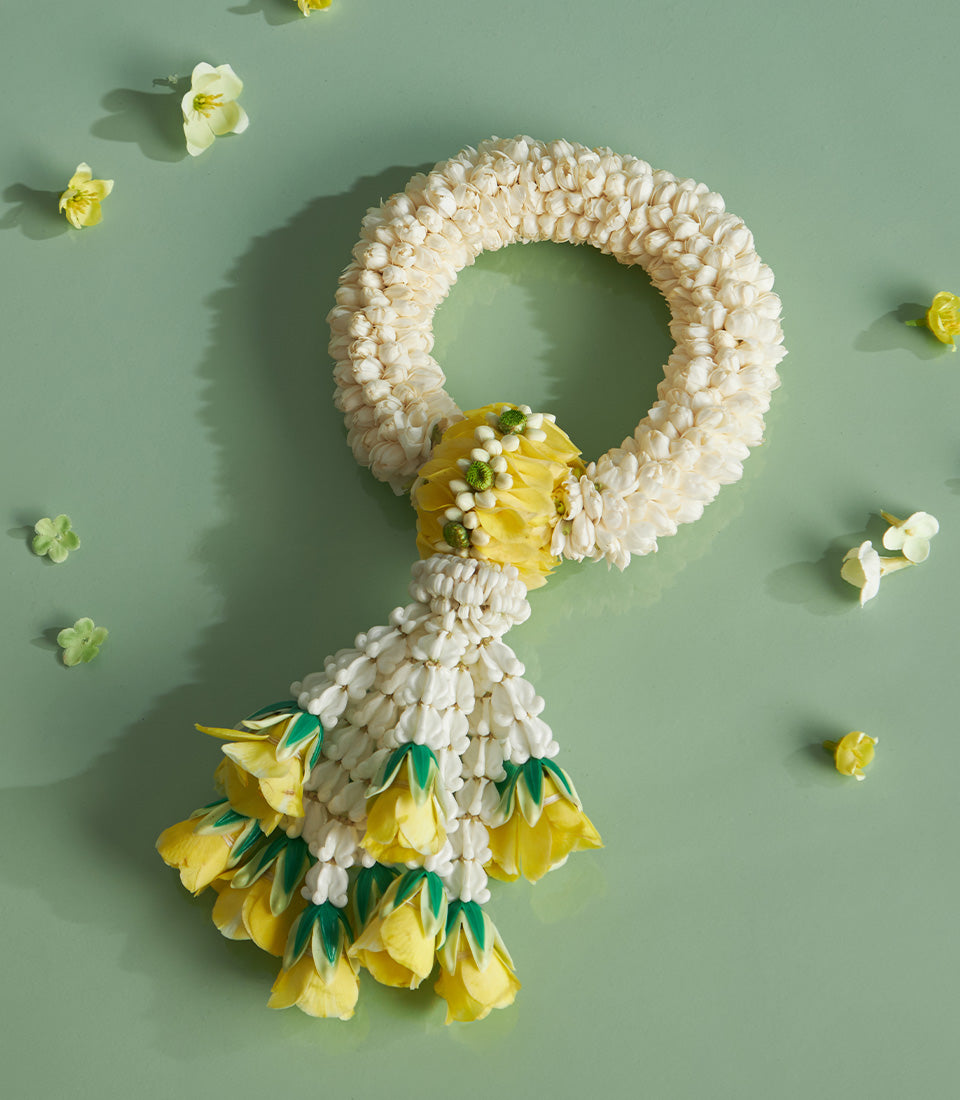 Traditional Thai jasmine garland with yellow flowers for Songkran celebration