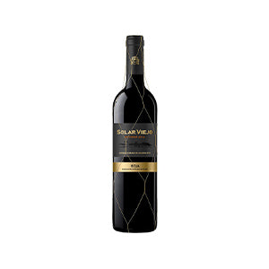 Premium Spanish Rioja red wine with gold-accented label in luxury gift hamper