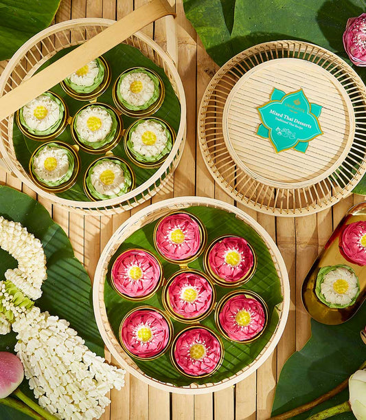 Thai lotus-shaped desserts in bamboo baskets with banana leaf packaging, Songkran New Year gift set