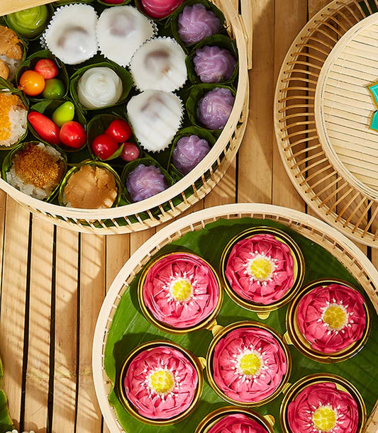 Basketeer premium hamper delivery Thailand: Woven baskets of Thai sweets including Ar-Lua lotus blossom desserts. A luxurious Bangkok gift.