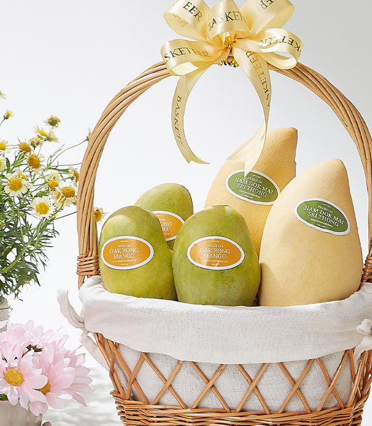 Imperial Gold premium Thai mango selection in wicker basket with gold ribbon bow