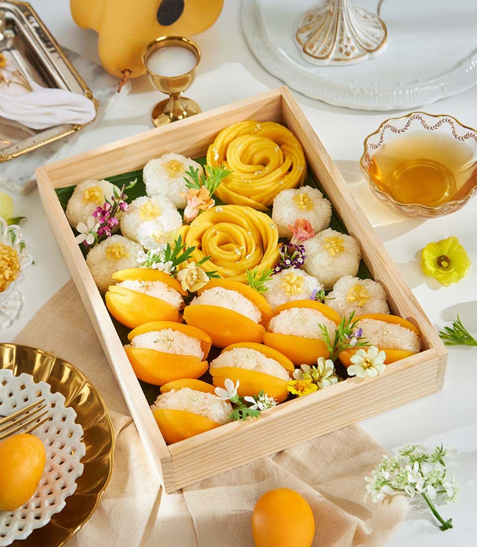 Harmony mango and sticky rice gourmet gift box with carved mango roses, fresh fruit, and edible gold