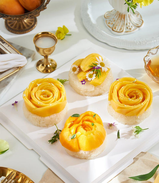 Royal Trio Tropical Sticky Rice Delight with mango roses and gold leaf on white sticky rice