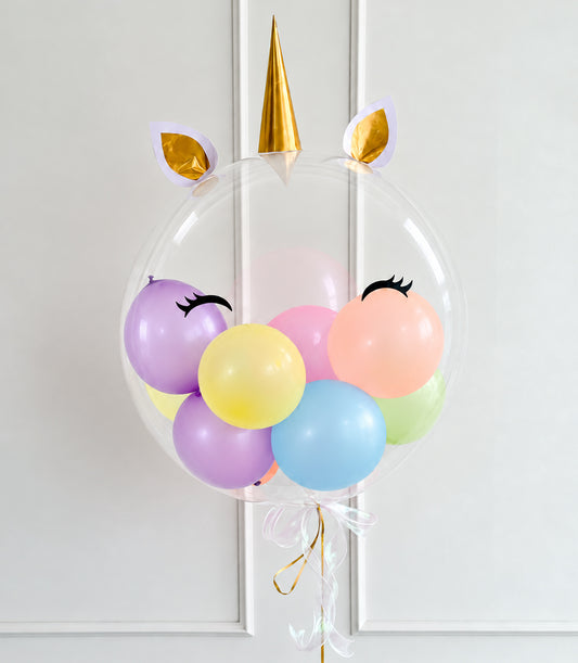Basketeer's whimsical unicorn dream balloon gift with pastel balloons